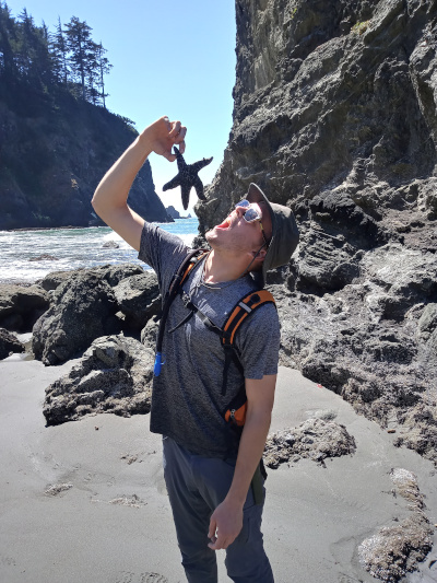 a picture of me pretending to eat a starfish